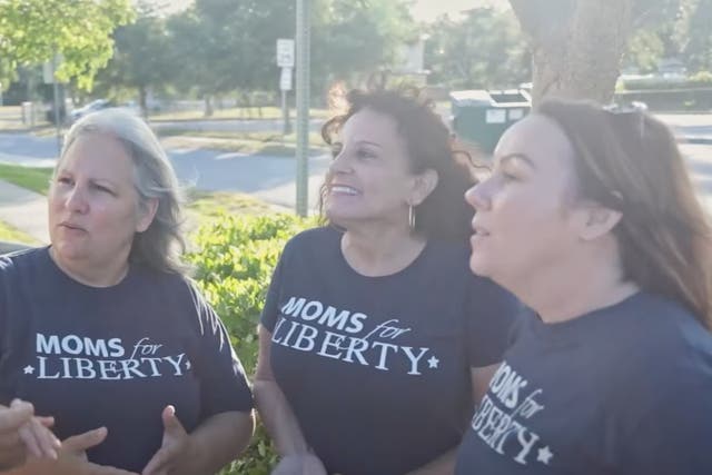 <p>A group of women in the “Moms for Liberty” conservative group. The group objects to race-related school books and lessons.</p>