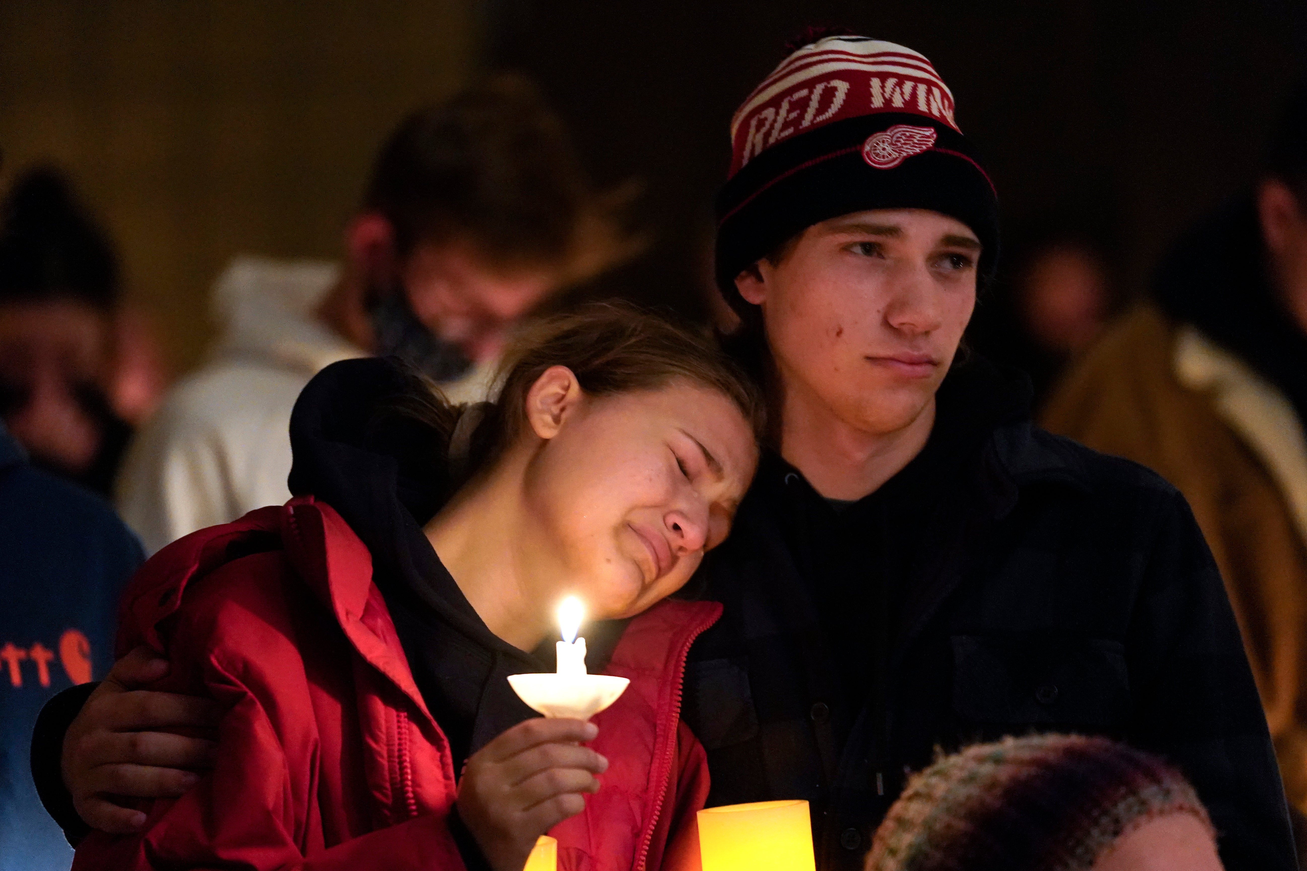 Students attend a vigil hours after the shooting at Oxford High School on Tuesday
