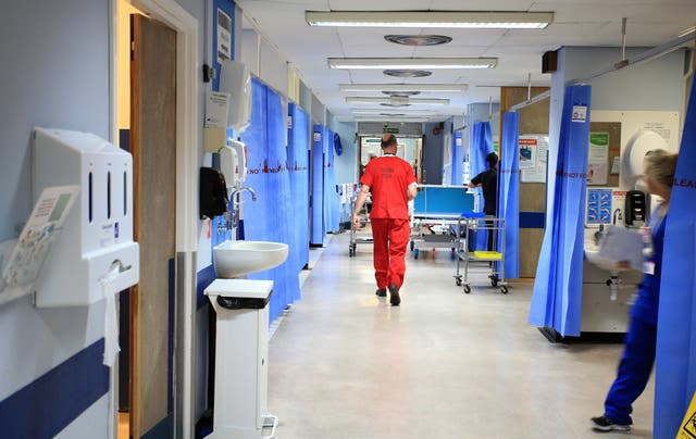 The National Audit Office has warned the NHS waiting list could double in just over three years (PA)