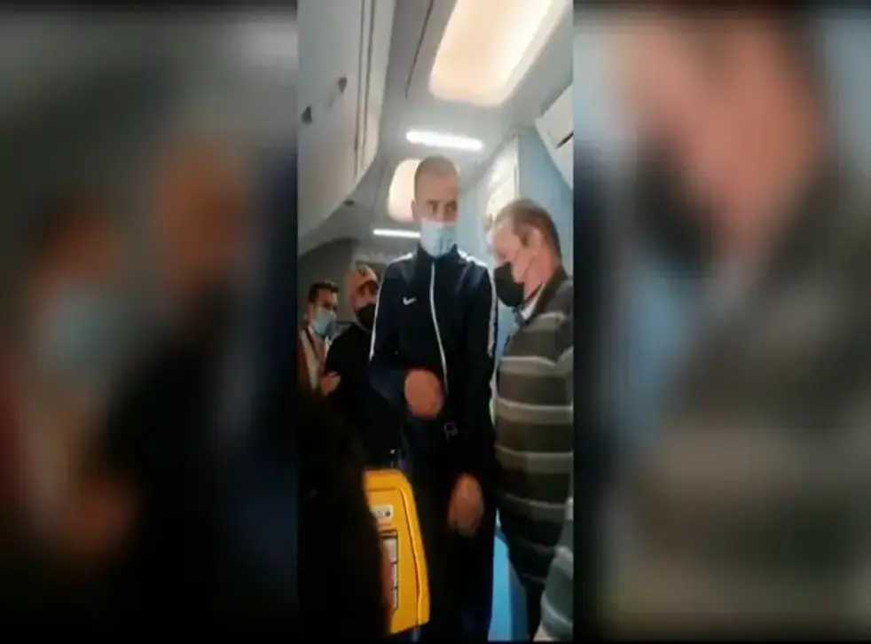 <p>The man in the video before he alarms passengers by running to the front of the plane</p>