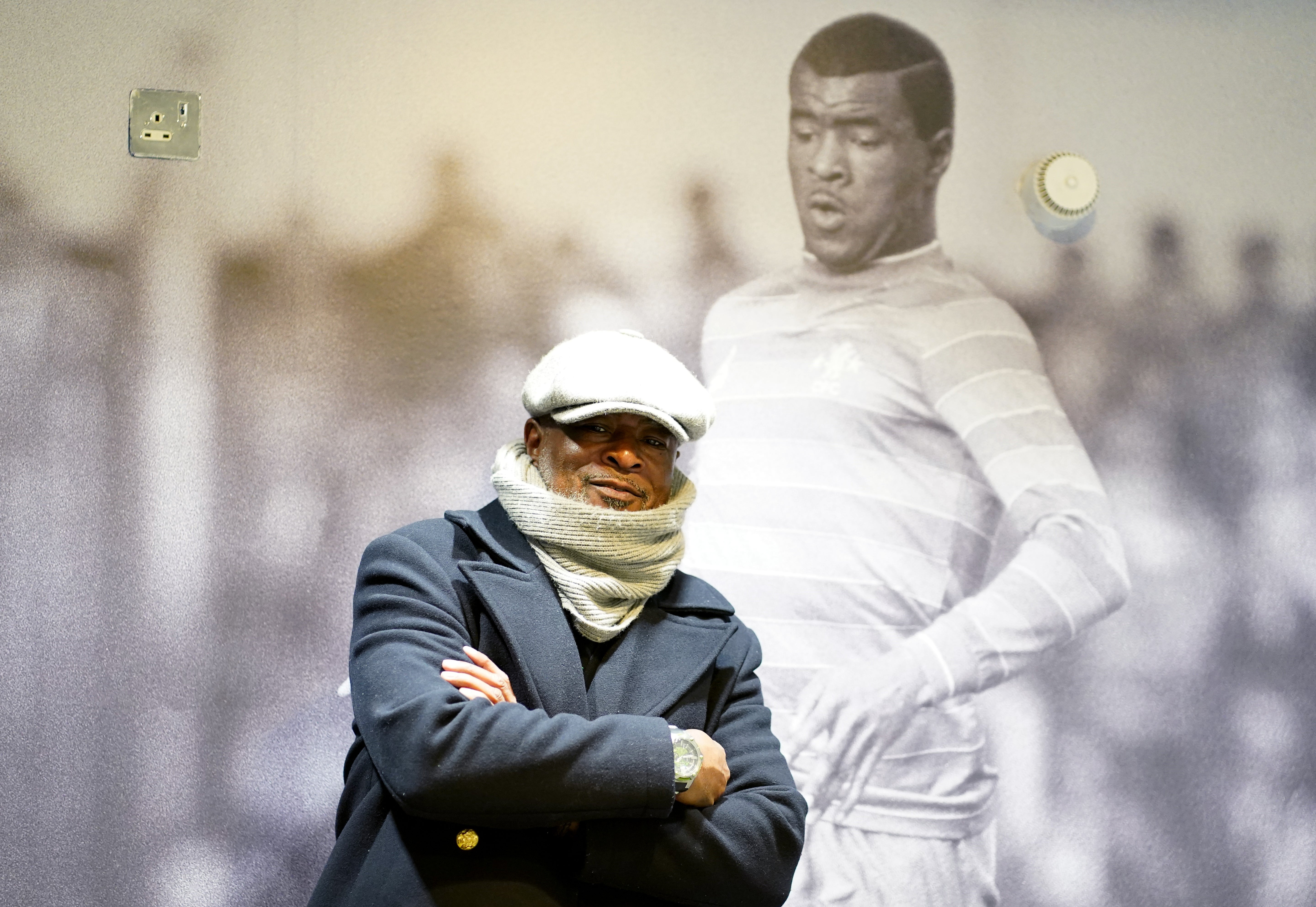 Paul Canoville, pictured, in front of a shot of him in his playing days, at the suite named in his honour at Stamford Bridge (Adam Davy/PA)
