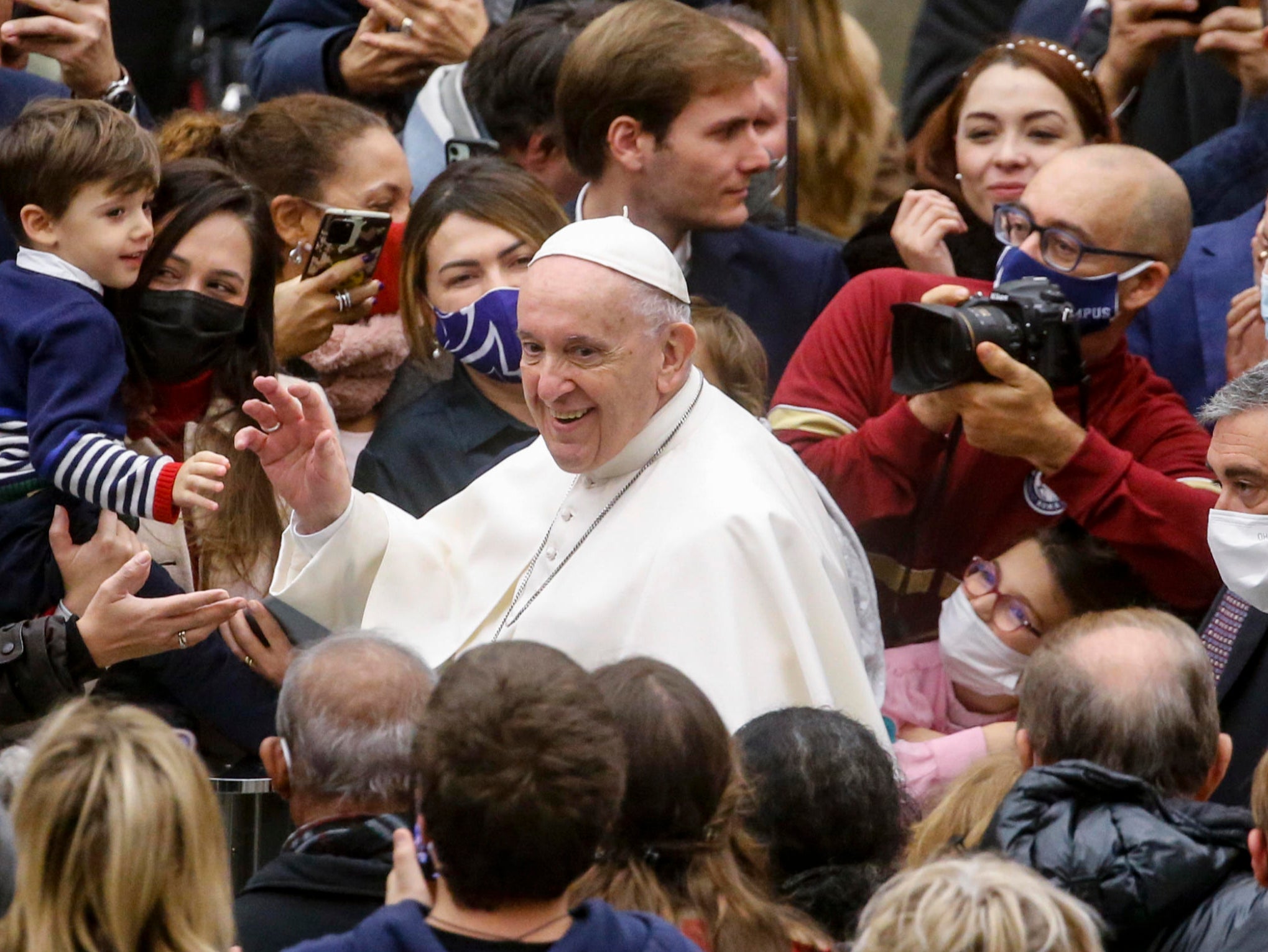 Pope Francis greets the faithful during his weekly general audience in Vatican City