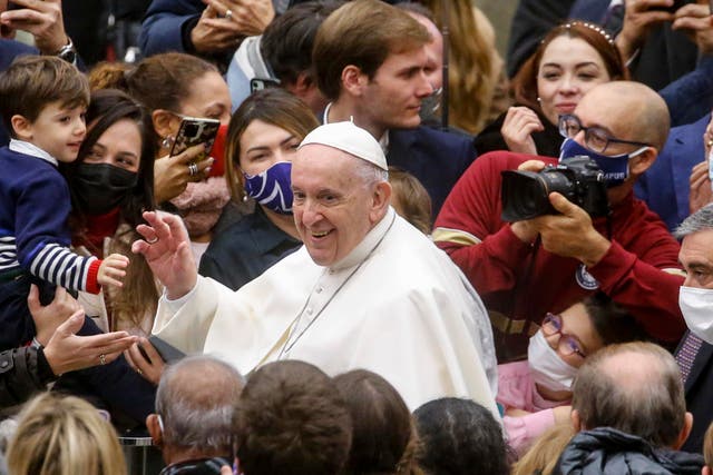 <p>Pope Francis greets the faithful during his weekly general audience in Vatican City</p>