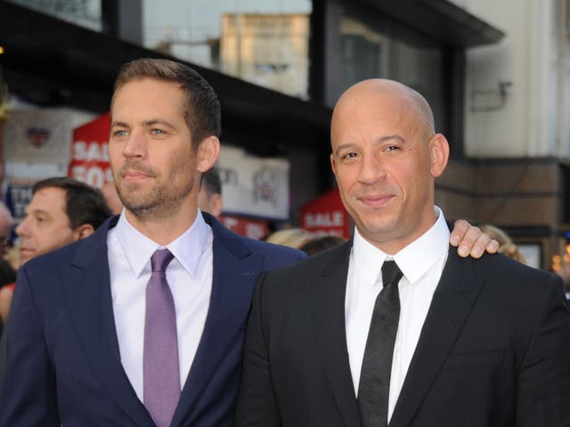 <p>Paul Walker and Vin Diesel photographed in 2013, months before Walker’s death</p>