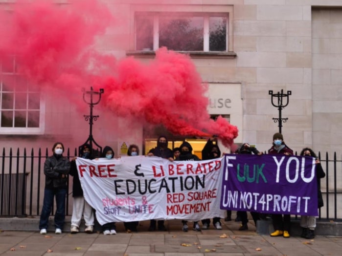 Students stand outside UUK offices