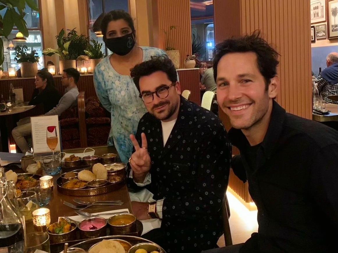 The photo of Asma Khan with Dan Levy and Paul Rudd in her restaurant, Darjeeling Express, that went viral in September 2021