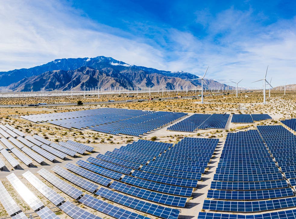 <p>Solar panels and wind turbines in California. China, India, the US and Europe account for 80 per cent of renewable expansion worldwide</p>