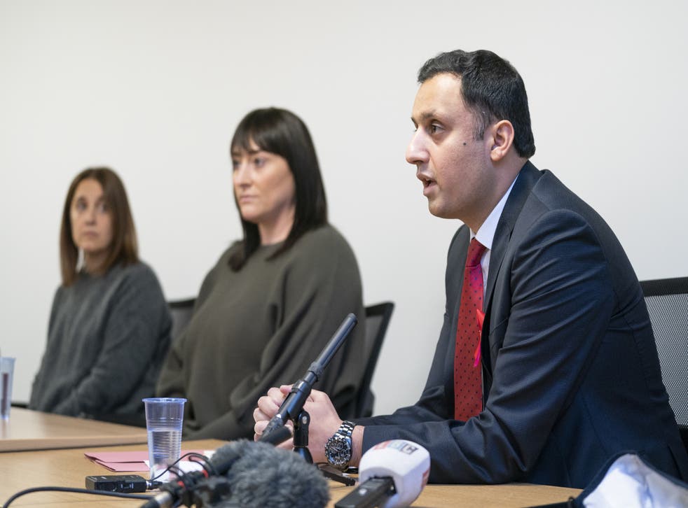 Louise Slorance, Kimberly Darroch and Scottish Labour leader Anas Sarwar are calling for the senior management of NHS Greater Glasgow and Clyde to step down (Jane Barlow/PA)