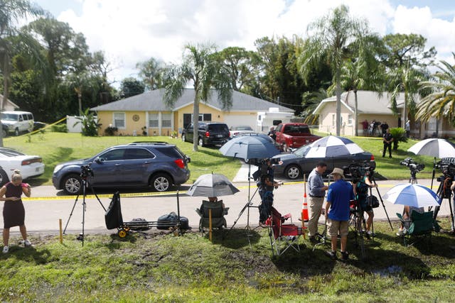 <p>Members of the media are lined up near the home of Brian Laundrie on September 20, 2021 in North Port, Florida</p>