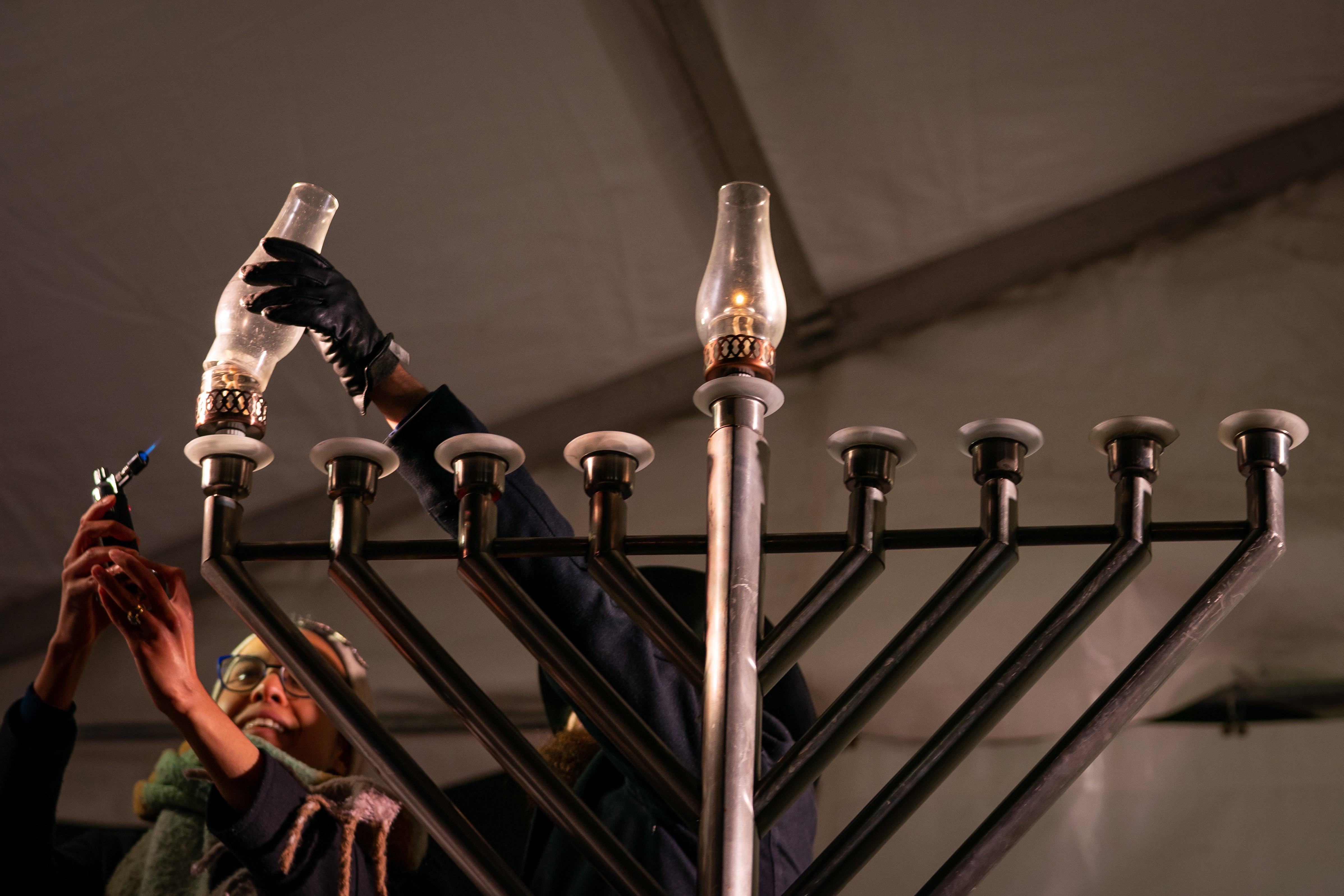 The Jewish festival of Hanukkah is celebrated with lighting eight-armed candelabras, or menorahs (Aaron Chown/PA)