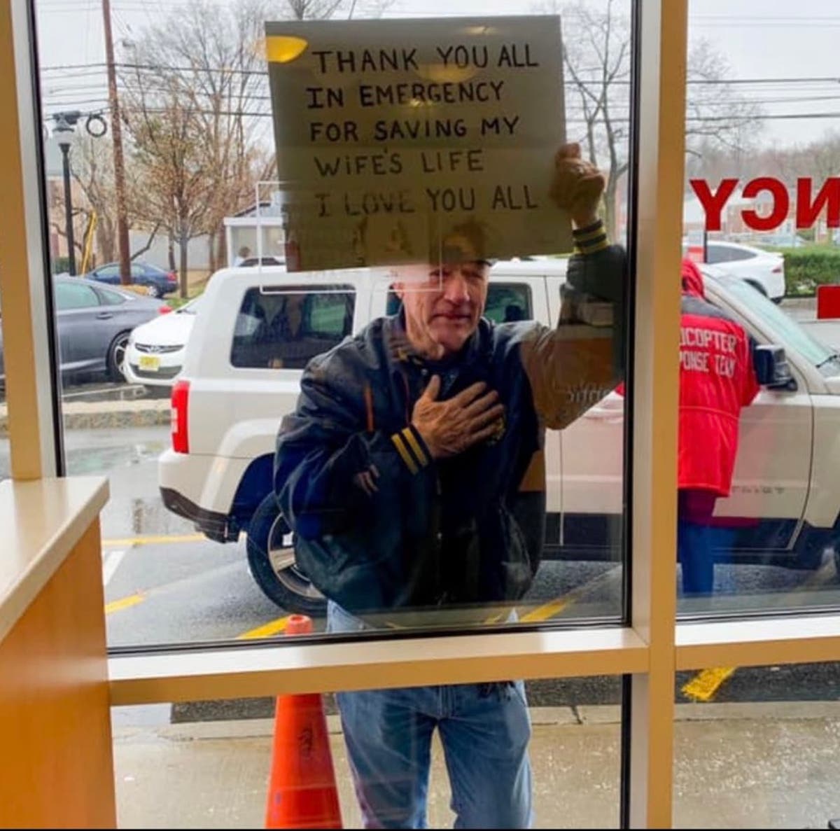 EXCLUSIVE: Mystery man who went viral for sign thanking ER staff identified