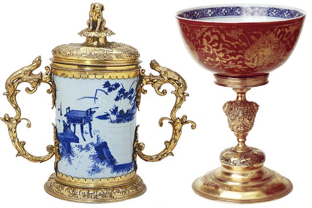 <p>From left: The <em>Blue-and-white Brush Pot with Antiques, Transformed into a Covered Cup,</em> from the reign of Emperor Chongzhen (1628-44); The<em> Blue-and-white Kinrande Bowl with Lotus Scrolls in Silver-gilt Mount, </em>from the reign of Emperor Jiajing (1522-66)</p>