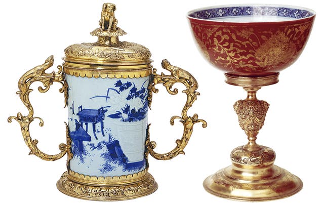 <p>From left: The <em>Blue-and-white Brush Pot with Antiques, Transformed into a Covered Cup,</em> from the reign of Emperor Chongzhen (1628-44); The<em> Blue-and-white Kinrande Bowl with Lotus Scrolls in Silver-gilt Mount, </em>from the reign of Emperor Jiajing (1522-66)</p>