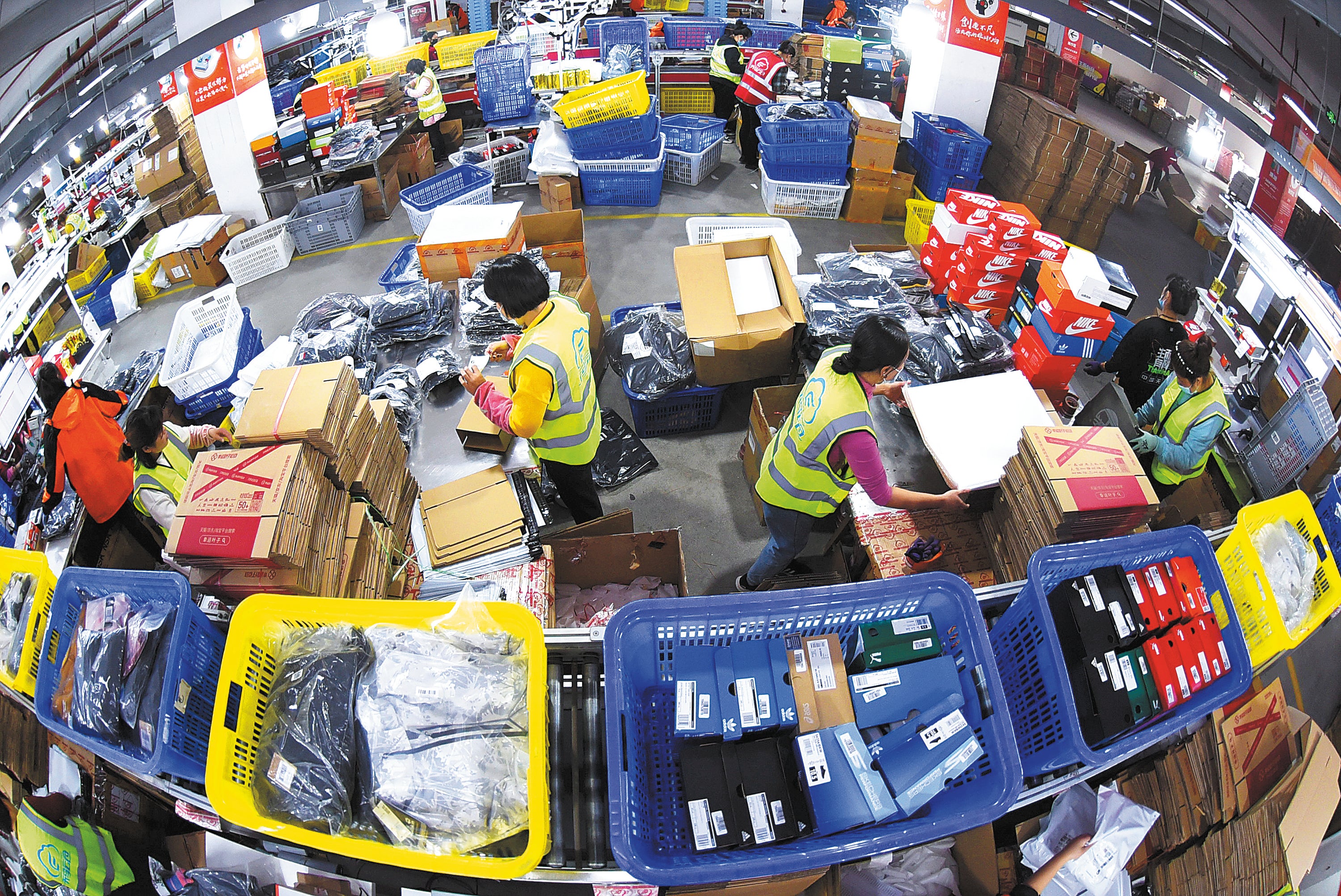 Workers busy packaging goods at an e-commerce industrial zone in Lianyungang, Jiangsu province, as China’s Singles Day shopping festival starts