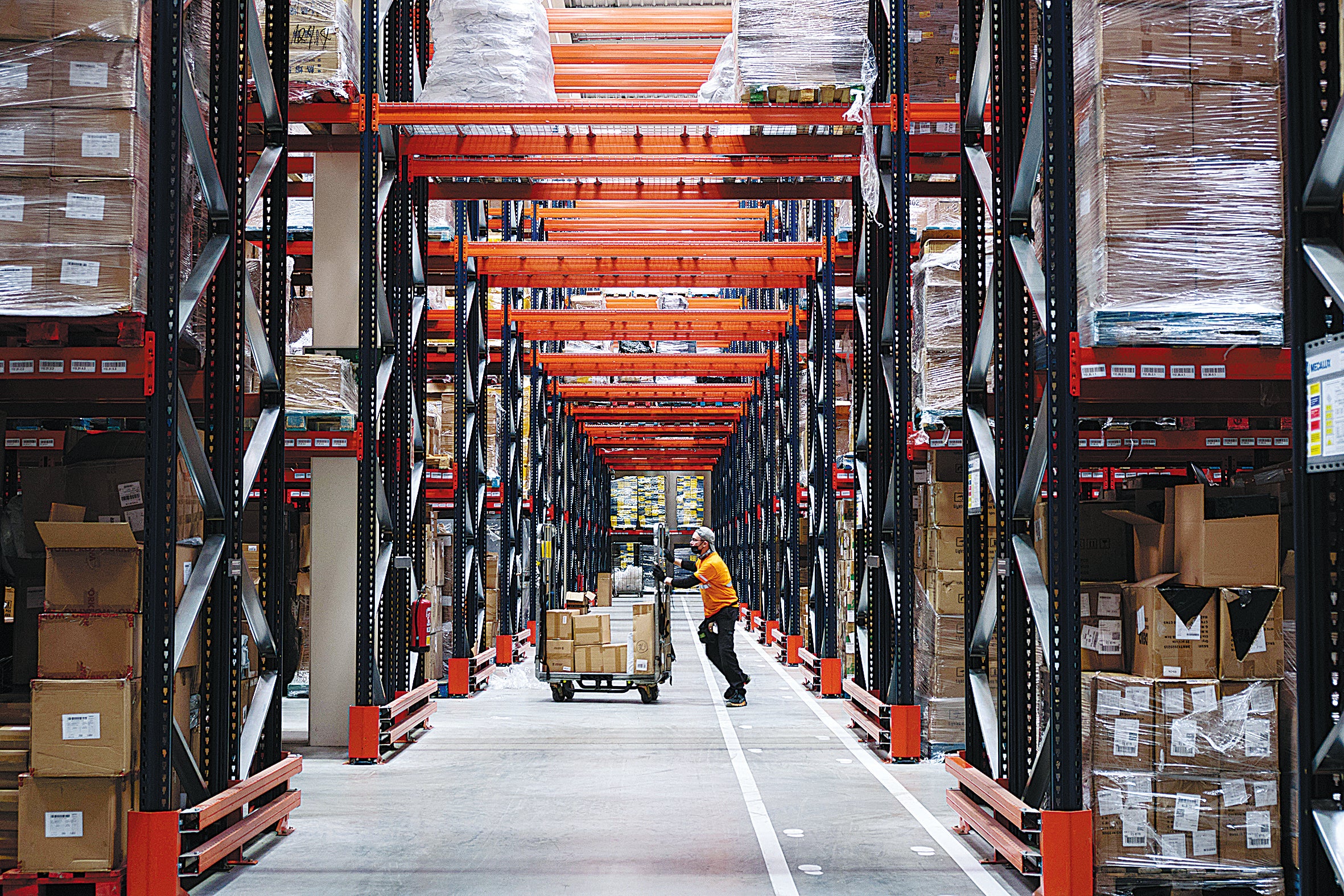 An employee works at a warehouse owned by Cainiao Network in Guadalajara, Spain