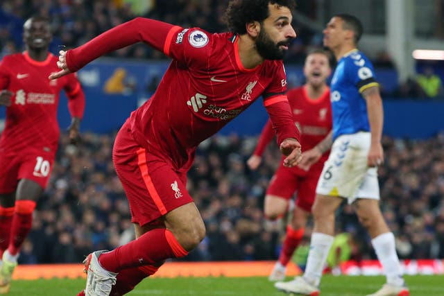 <p>Mohamed Salah celebrates his brace against Everton</p>
