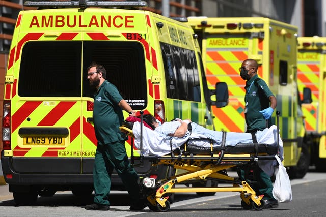 <p>A patient is pictured outside the Royal London hospital on 23 July, 2021. </p>