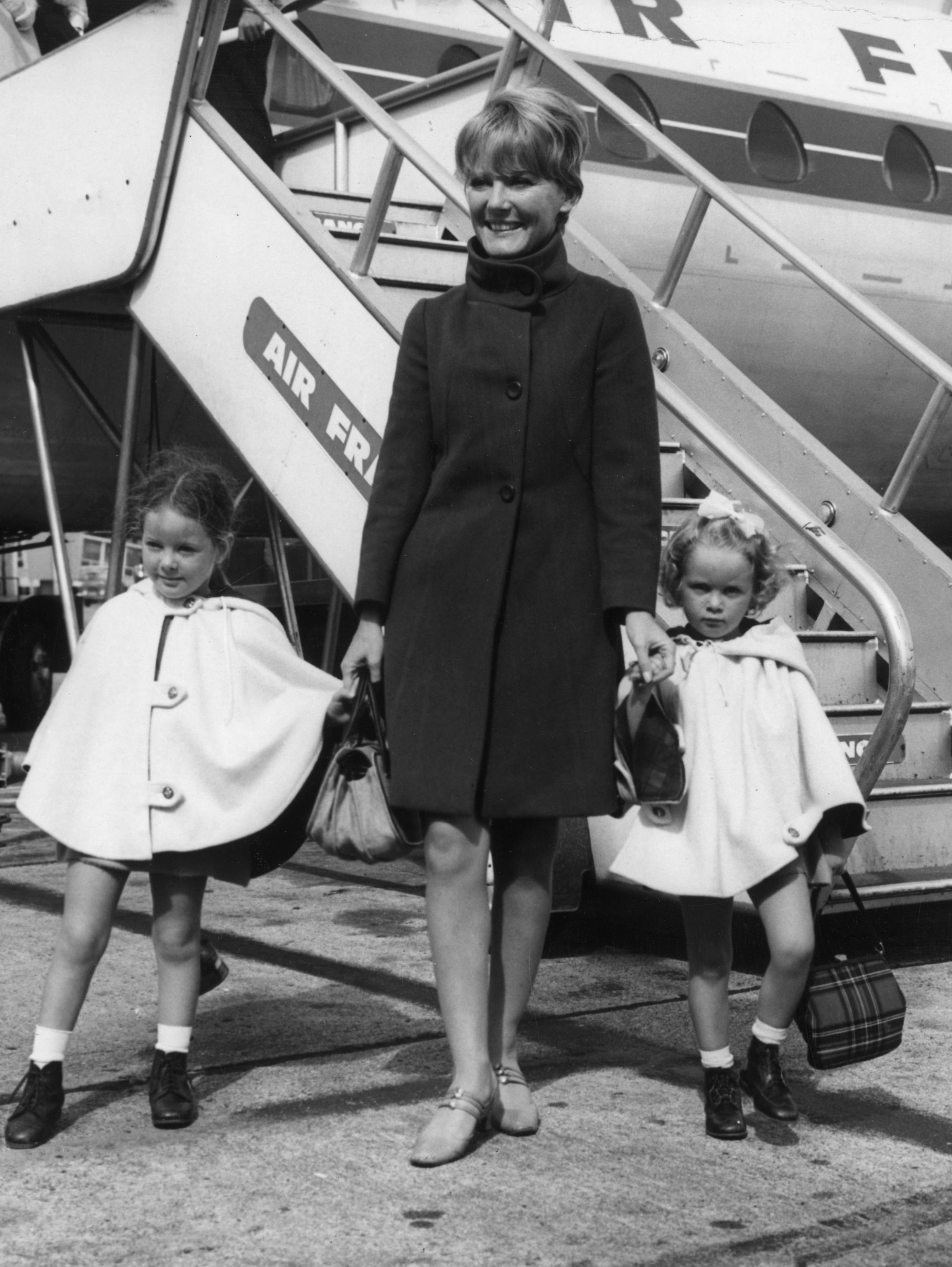 Petula Clark arriving in London with her two daughters, 1966