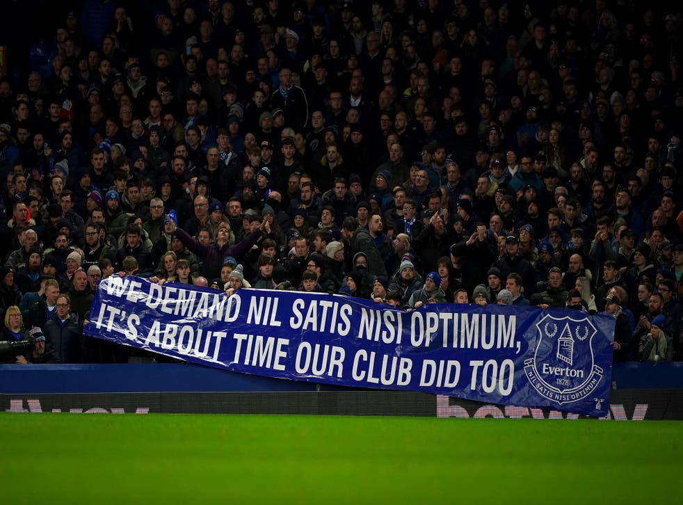A banner displayed by Everton fans referring to the club’s motto ‘Nil Satis Nisi Optimum’, which translates as ‘nothing but the best is good enough’ (Peter Byrne/PA)