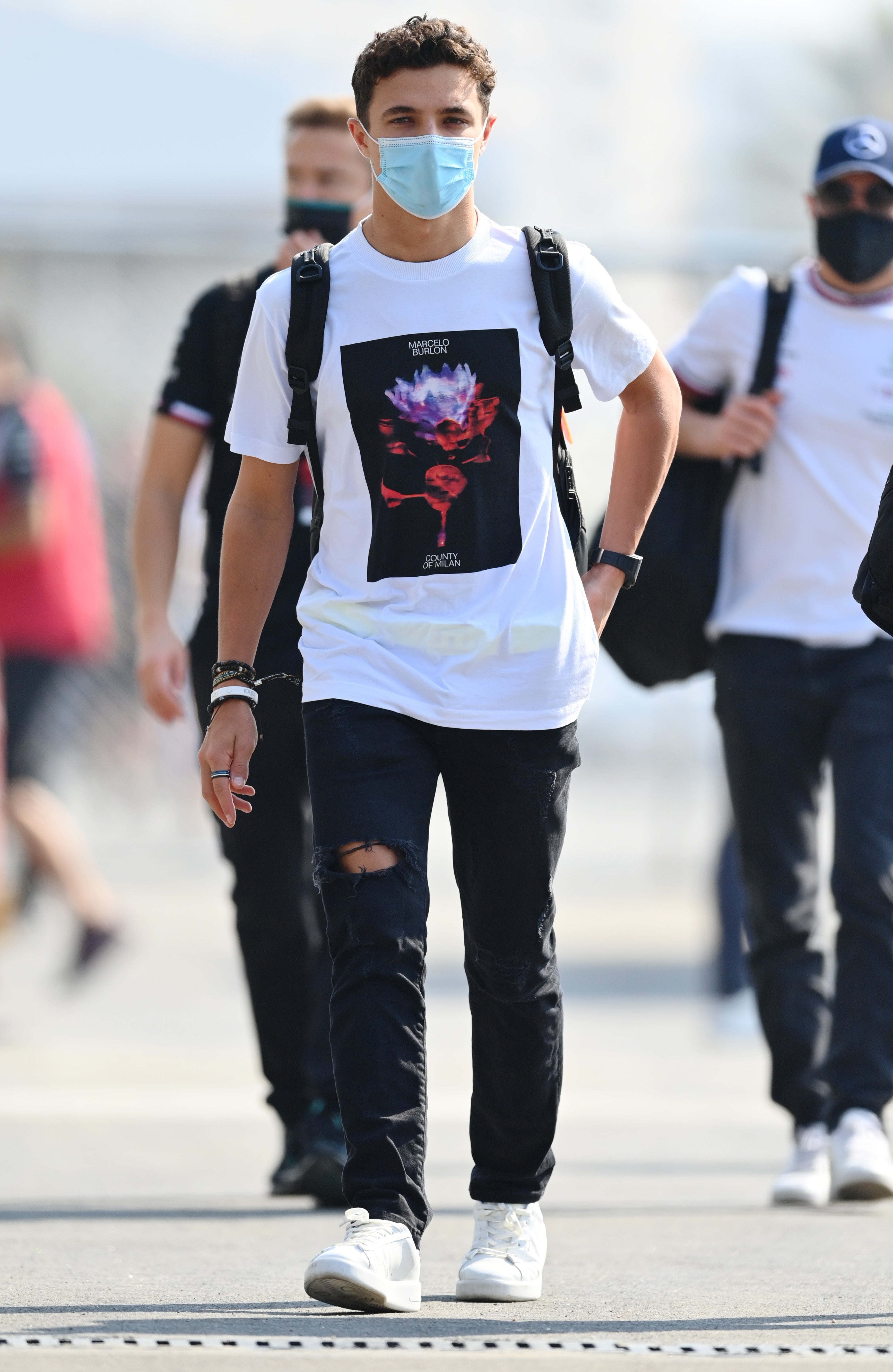 Lando Norris walks in the paddock during previews ahead of F1 Grand Prix of Saudi Arabia at Jeddah Corniche Circuit