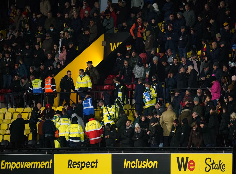 Medical staff attend to an emergency in the stands (Mike Egerton/PA)