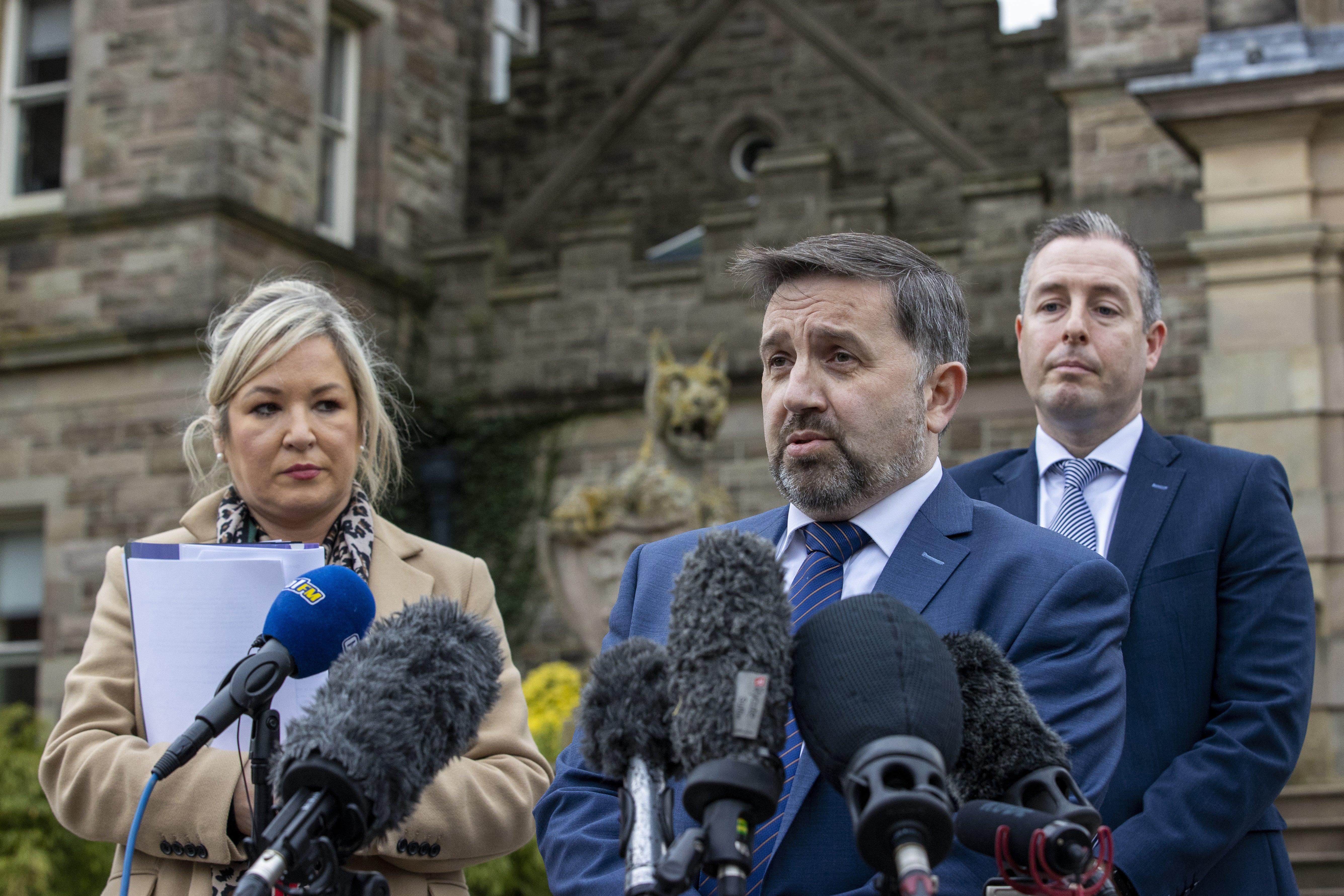 Northern Ireland Minister of Health Robin Swann (centre) with deputy First Minister Michelle O’Neill and First Minister Paul Givan (Liam McBurney/PA)