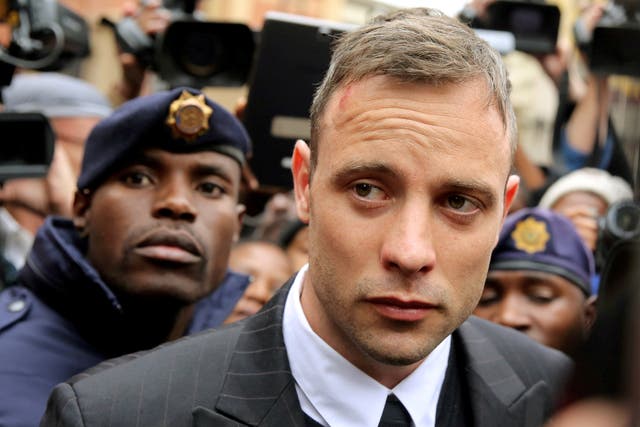 <p>File photo: Oscar Pistorius leaves court after appearing for the 2013 killing of his girlfriend Reeva Steenkamp</p>