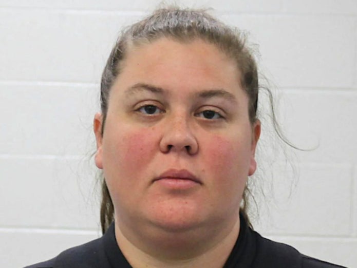 Katrina Phelan, a former teacher at Abraham Lincoln High School in Council Bluffs, Iowa, was arrested after leaving handwritten notes threatening violence around her school. The notes were supposed to look like they came from a student