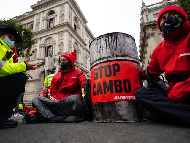 <p>Campaigners from Greenpeace opposed to Cambo oilfield project outside Downing Street last year.  </p>