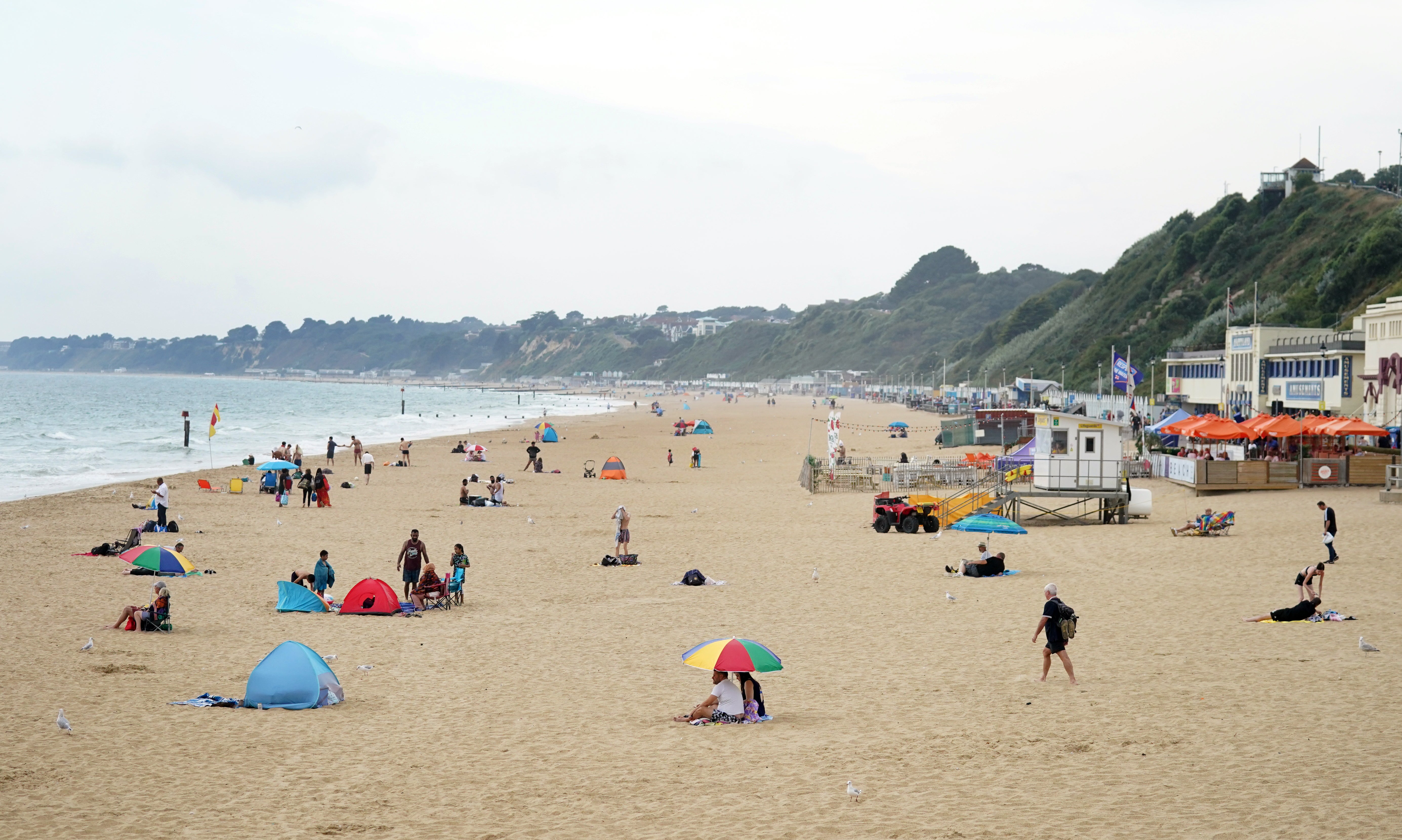 People on Bournemouth beach in Dorset