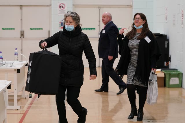 Ballot boxes arrive during the count for the Old Bexley and Sidcup by-election at Crook Log Leisure Centre in Bexleyheath, Kent. Picture date: Thursday December 2, 2021.