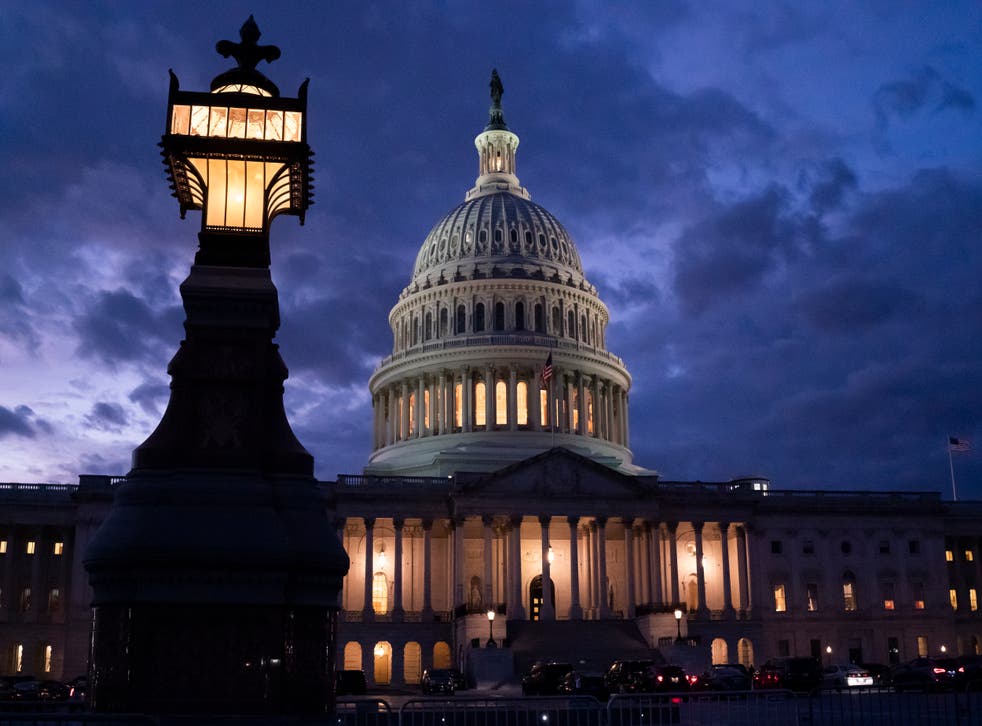 <p>Night falls at the Capitol in Washington</p>
