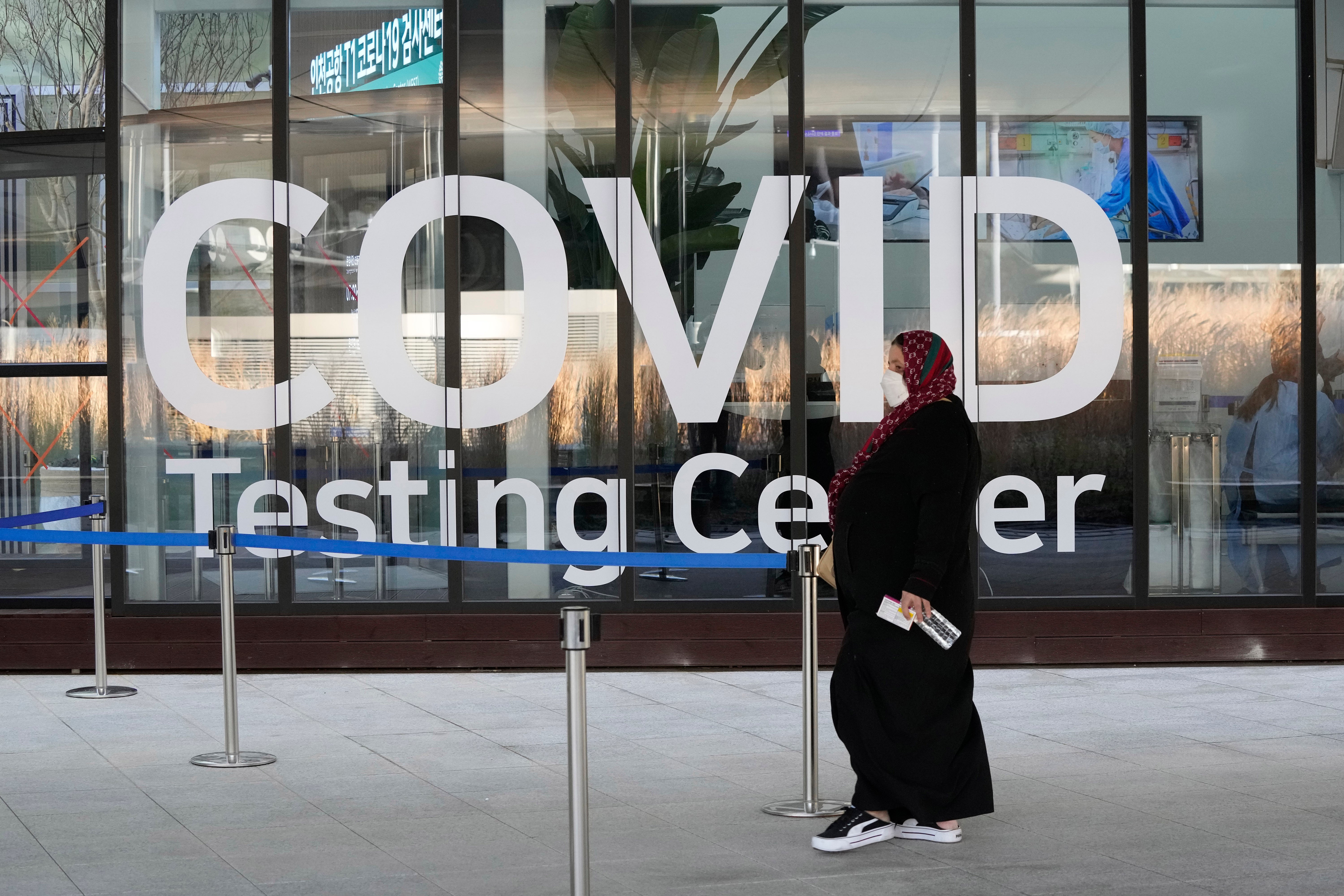 A traveler arrives to enter into a Covid-19 testing center at the Incheon International Airport In Incheon