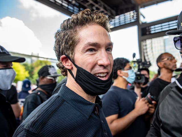 <p>Pastor Joel Osteen arrives before a march in honor of George Floyd on June 2, 2020 in Houston, Texas</p>