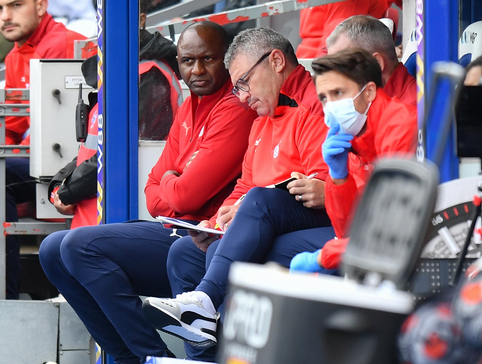 Crystal Palace assistant manager Osian Roberts, centre, with Patrick Vieira, left (Ashley Western/PA)