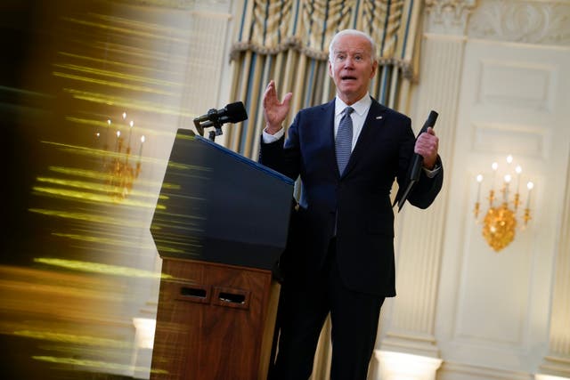 <p>President Joe Biden answers a reporters question after delivering remarks on the November jobs report, in the State Dining Room of the White House, Friday, Dec. 3, 2021, in Washington. (AP Photo/Evan Vucci)</p>