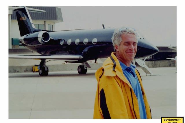 Jeffrey Epstein standing in front of his second private plans (US Department of Justice/PA)