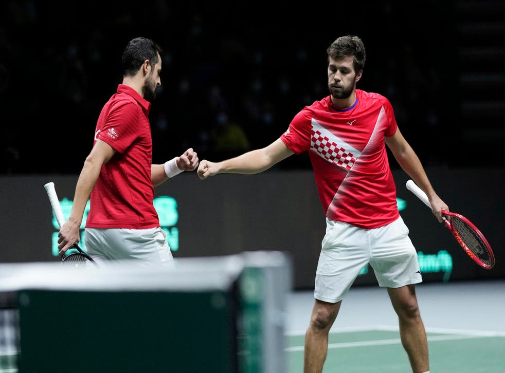 Mate Pavic and Nikola Mektic secured Davis Cup semi-final victory for Croatia (Bernat Armangue/AP)