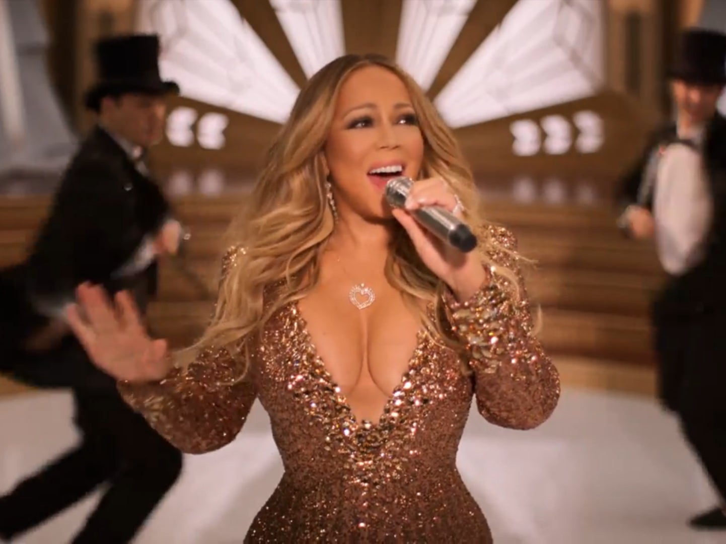 Mariah Carey sings in her Apple TV+ Christmas Special ‘Mariah Carey: The Magic Continues'