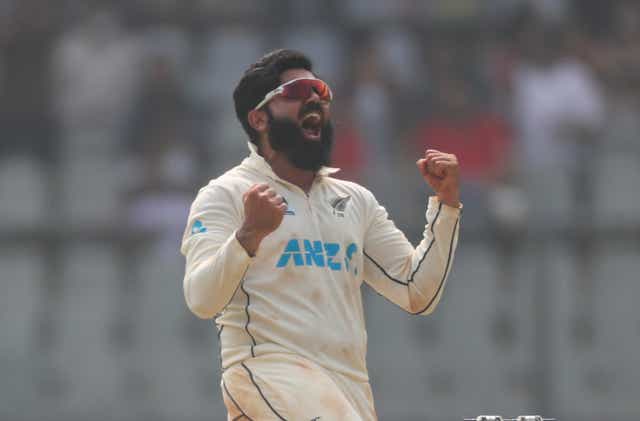New Zealand’s Ajaz Patel took a perfect 10 wickets against India (Rafiq Maqbool/AP)