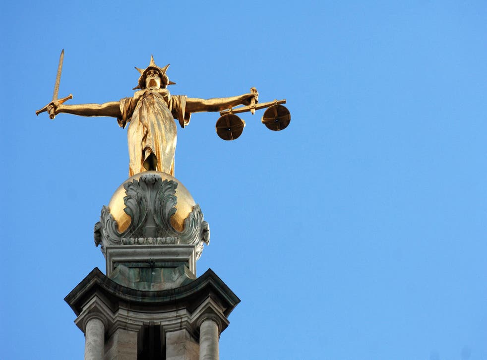 The statue of justice on the Old Bailey (Clara Molden/PA)