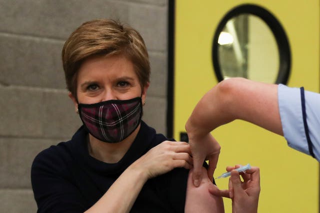 First Minister of Scotland Nicola Sturgeon receives her booster jab of the coronavirus vaccine in Glasgow (Russell Cheyne/PA)