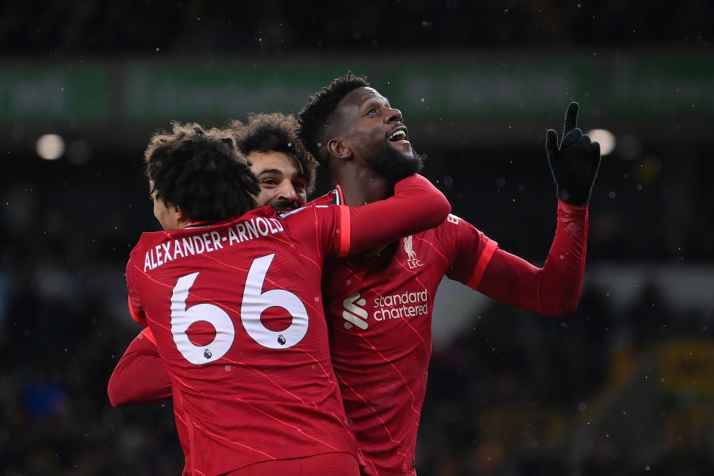 Divock Origi celebrates his winner with Trent Alexander-Arnold and Mohamed Salah