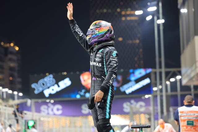 <p>The British driver salutes the crowd at the Jeddah Corniche Circuit</p>
