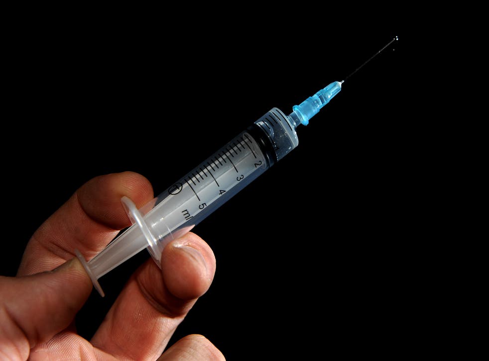 General view of a medical syringe (Andrew Matthews/PA)