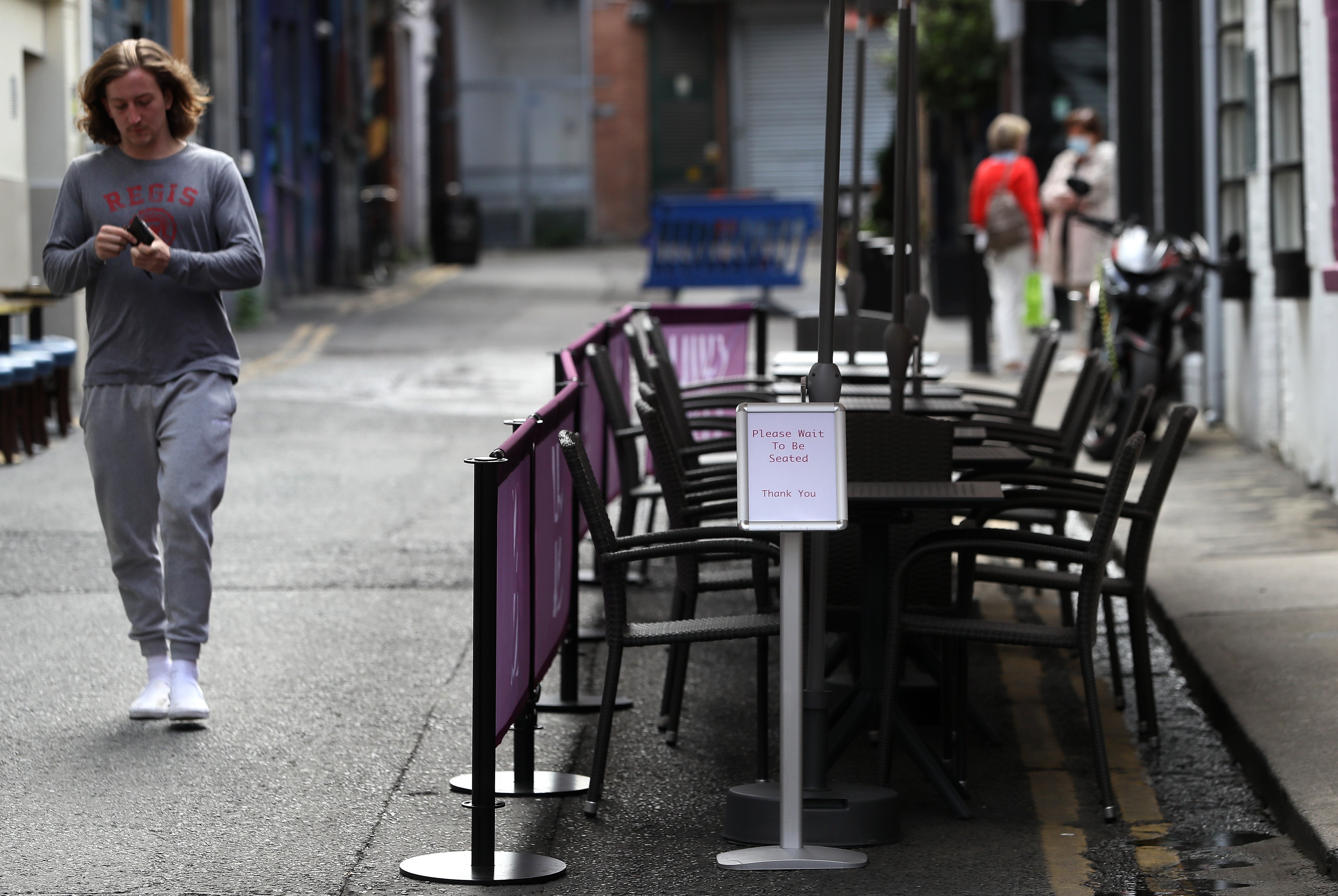 Social distancing is to be reintroduced in the hospitality sector in Ireland (Brian Lawless/PA)