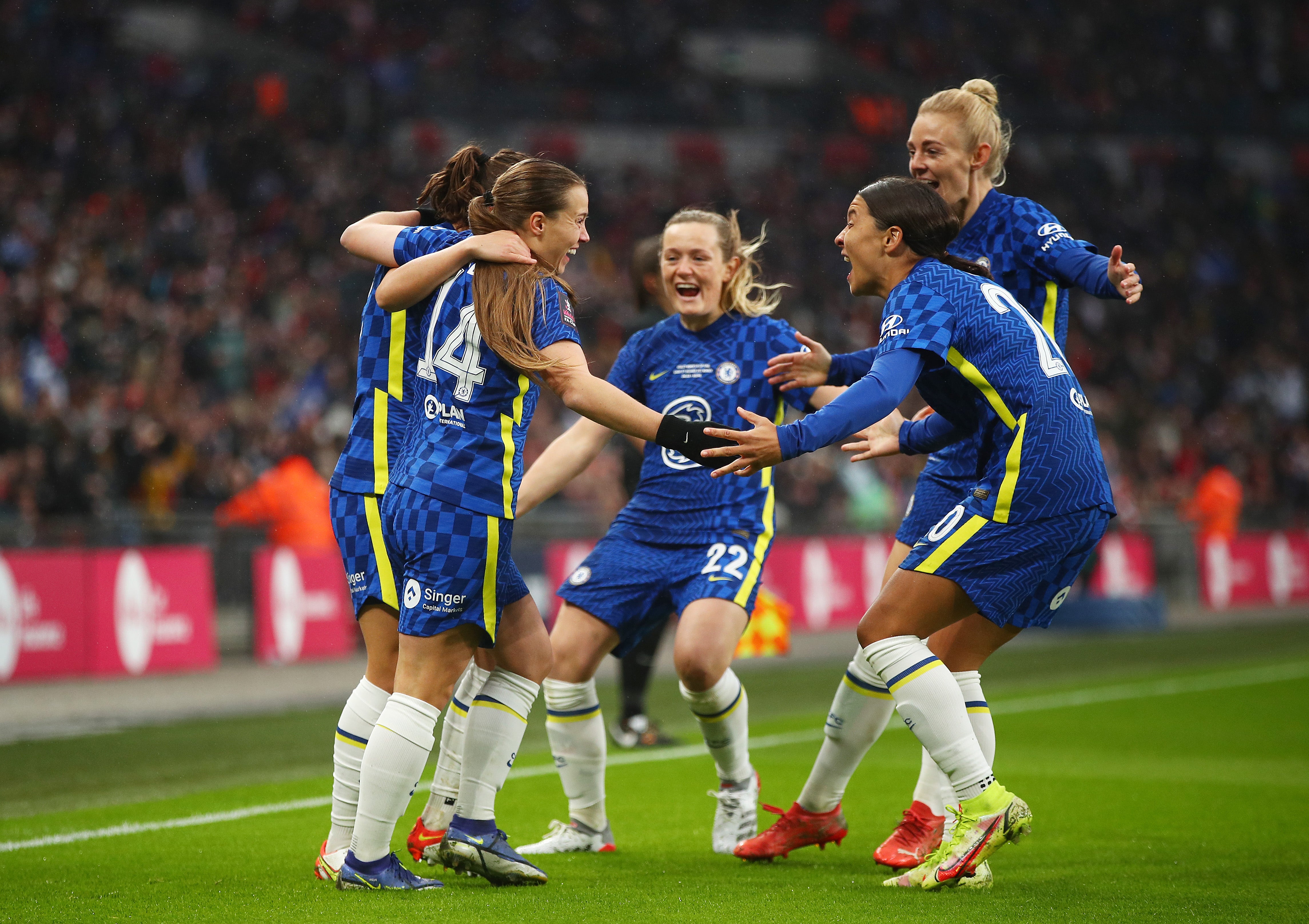 Fran Kirby celebrates with team mates after scoring