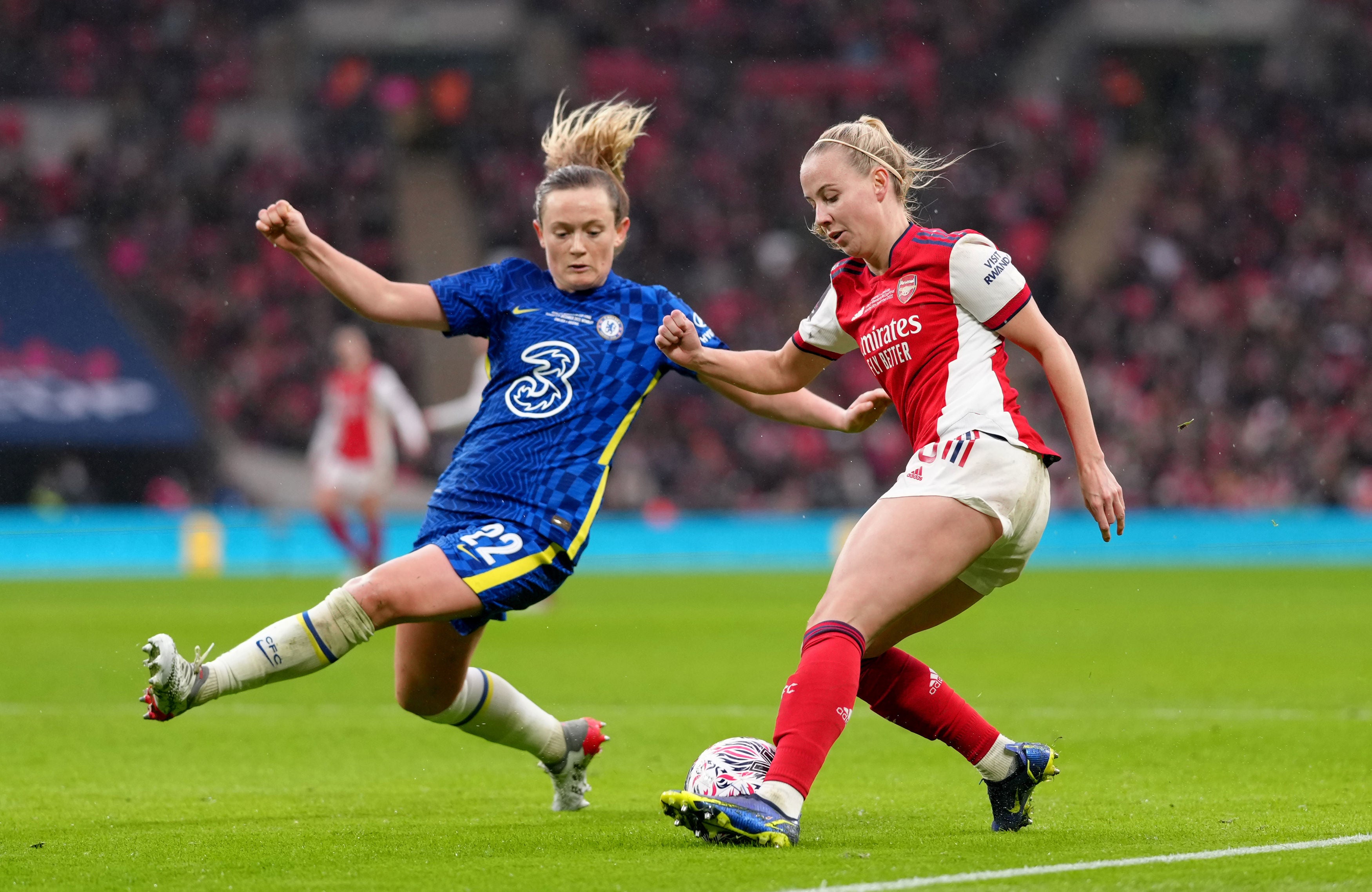 Erin Cuthbert and Arsenal’s Beth Mead battle for the ball