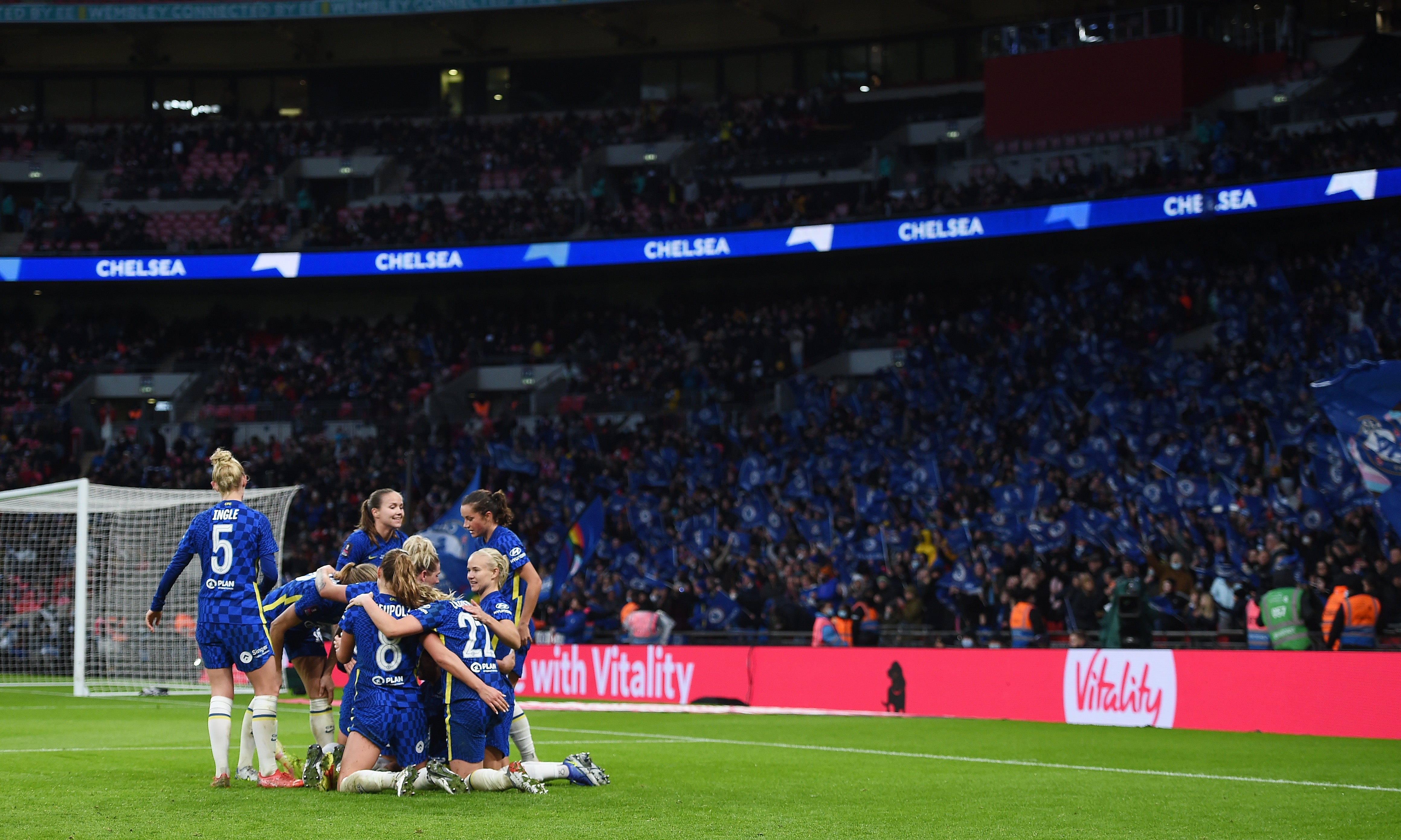 Sam Kerr celebrates with her Chelsea teammates