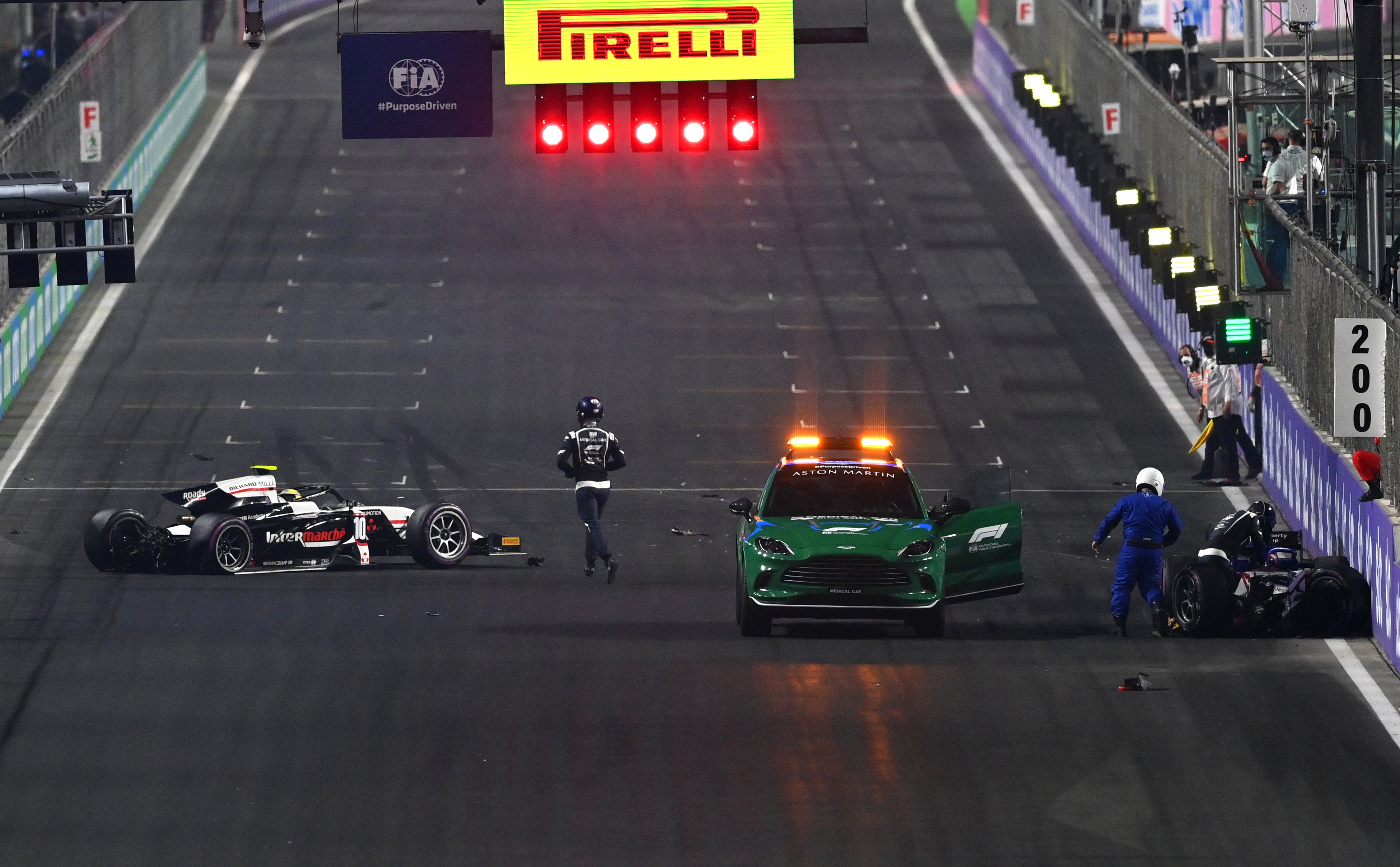 Theo Pourchaire and Enzo Fittipaldi wait for medical attention